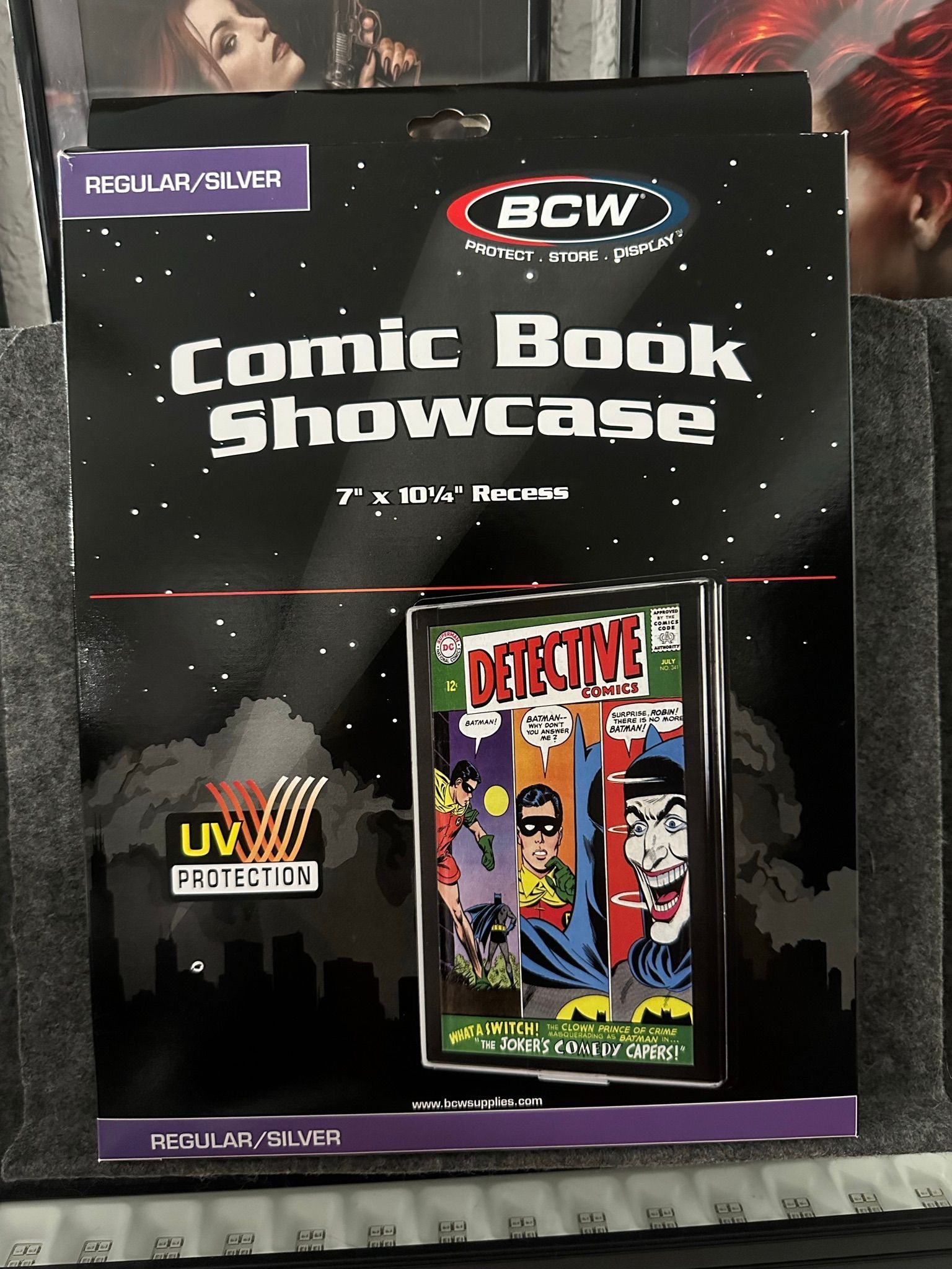 BCW Comic Book Showcase UV Protected. Modern and Silver. Hangs on the wall.